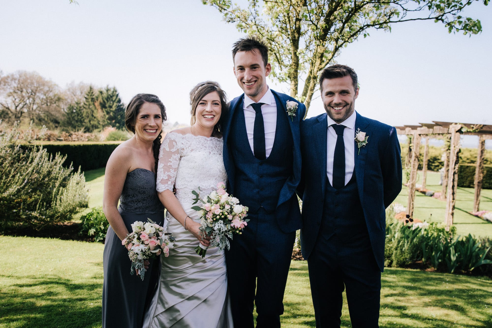 group shot of Maid of Honor, Best man, Bride and Groom