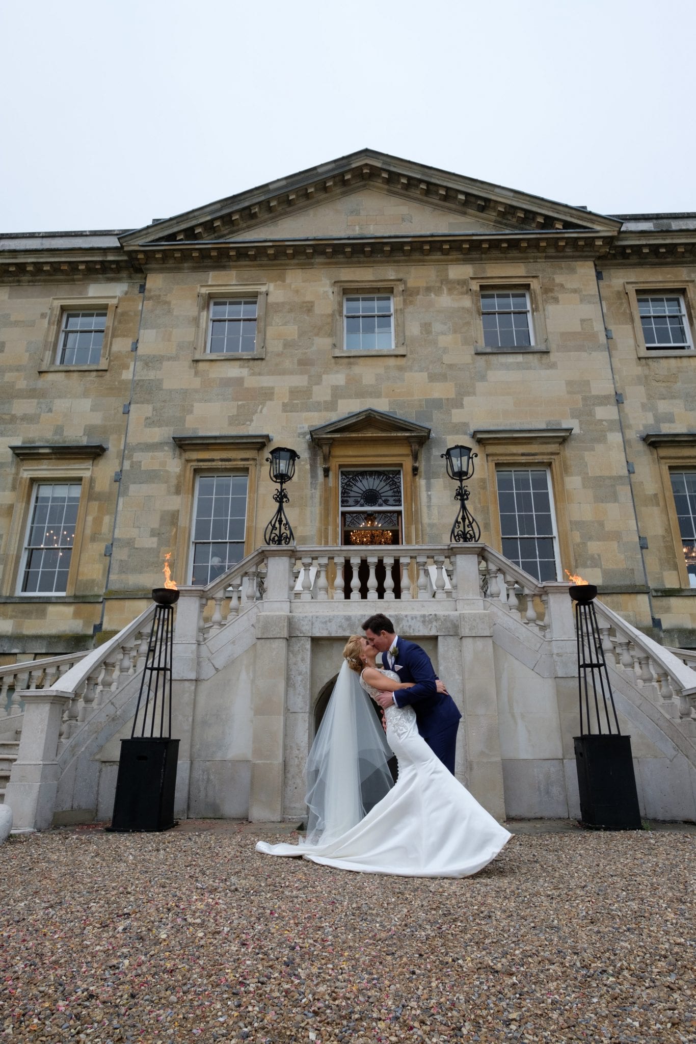 Botleys Mansion staircase entrance bride groom couple