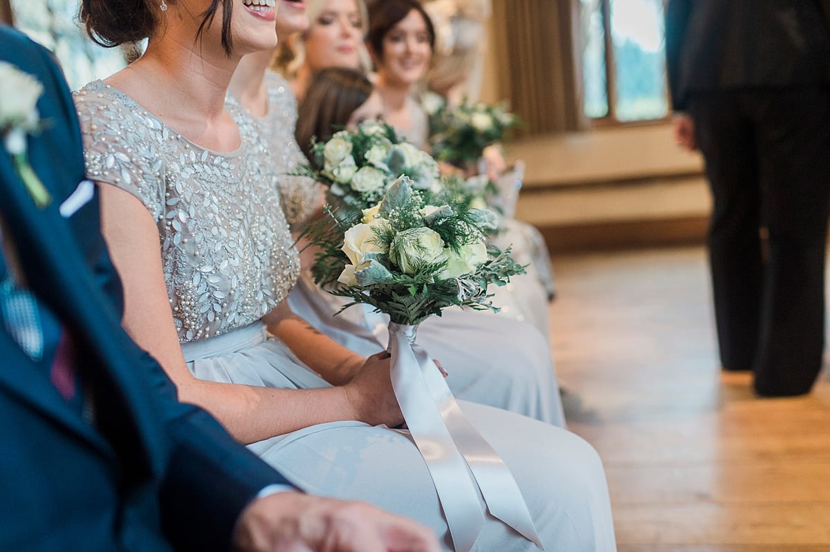Bridesmaids dress close up beaded detailing bouquet